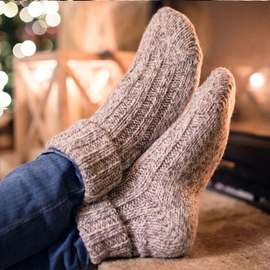 Made from wool, these socks provide warmth and moisture-wicking properties. Ideal for outdoor activities in cold weather, they offer excellent insulation and temperature control for the feet.