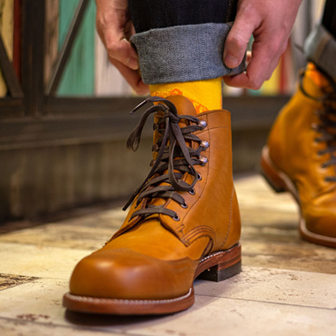 These socks are tailored for work boots, featuring added thickness and reinforcement in specific areas for enhanced support, cushioning, and durability during long workdays.